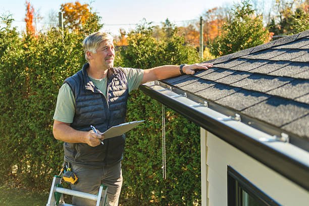 Professional Storm Damage Roof Repair technician working in Felda, FL